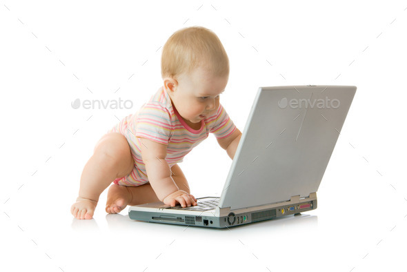 Small baby with laptop isolated