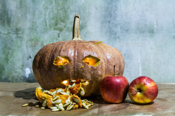 Haunted carved pumpkins for Halloween with apple (Misc) Photo Download