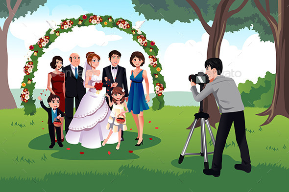 Man Photographing a Family in a Wedding Man Photographing a Family in a Wedding