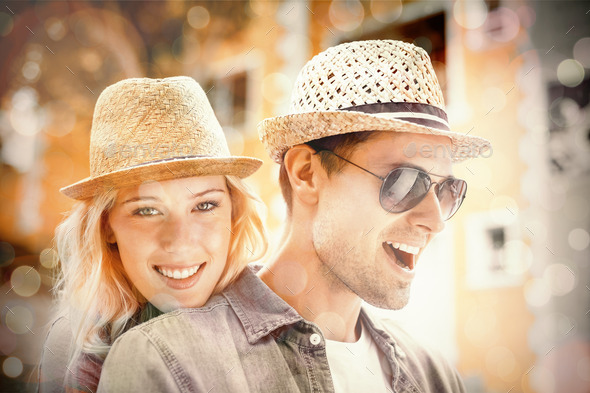 Hip young couple spending time together on a sunny day in the city (Misc) Photo Download