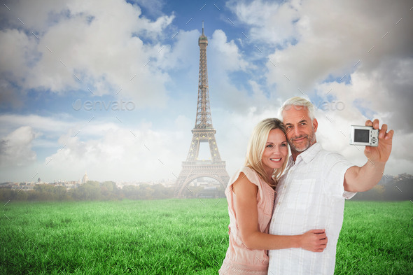 Happy couple posing for a selfie against eiffel tower (Misc) Photo Download