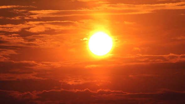 Dramatic Red Sunrise On Dark Cloudy Sky Dramatic Red Sunrise On Dark Cloudy Sky