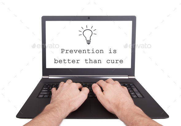Man working on laptop, preventions is better than cure (Misc) Photo Download