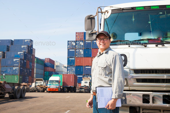 happy driver in front of container truck