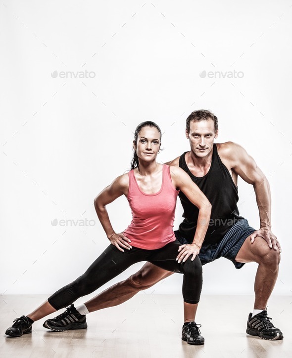 Athletic man and woman doing fitness exercise (Misc) Photo Download