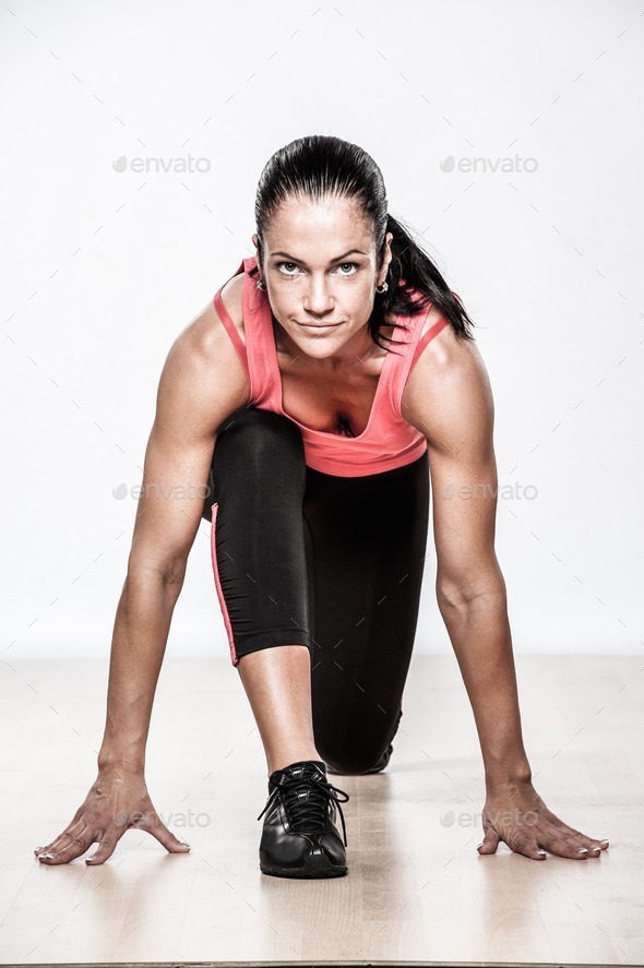 Beautiful athlete woman doing fitness exercise (Misc) Photo Download