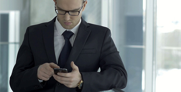 Businessman Using Mobile Phone Businessman Using Mobile Phone