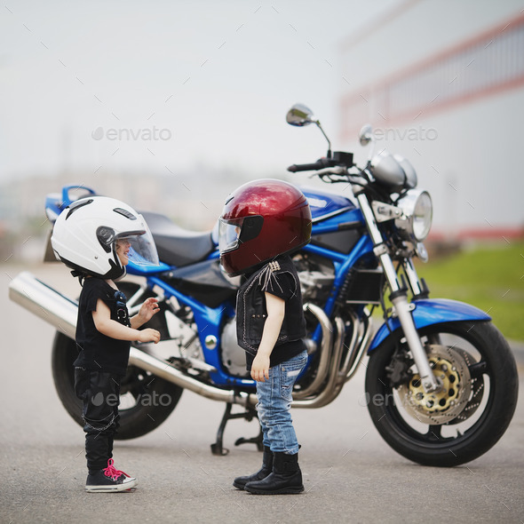 little bikers on road with motorcycle (Misc) Photo Download