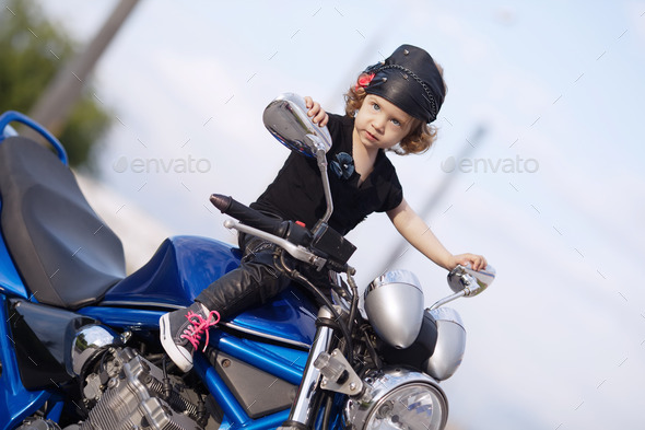 little biker on road with motorcycle (Misc) Photo Download