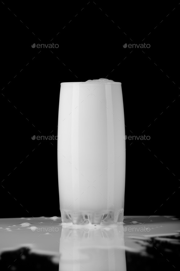 Glass of milk on black (Misc) Photo Download