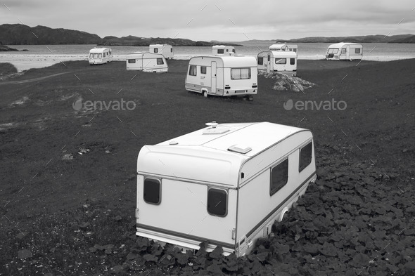 Camper vans parked on a beach. Scotland. UK. Horizontal