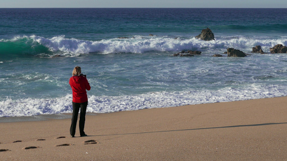 Woman Make Photo Waves in Ocean Woman Make Photo Waves in Ocean