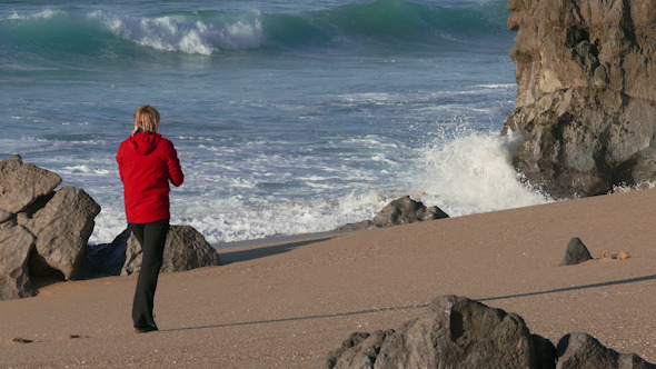 Woman Make Photo Waves in Ocean Woman Make Photo Waves in Ocean