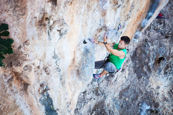 Rock climber on a face of a cliff (Misc) Photo Download