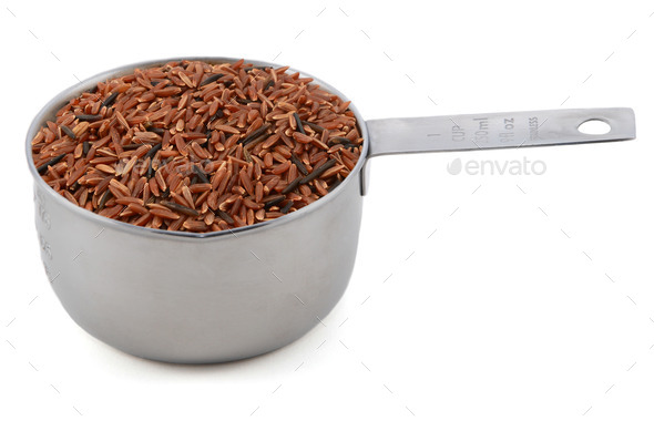 Camargue red rice grains in a cup measure (Misc) Photo Download