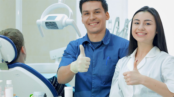 Closeup Of A Dentist That s Just Holding The Drill Closeup Of A Dentist That s Just Holding The Drill