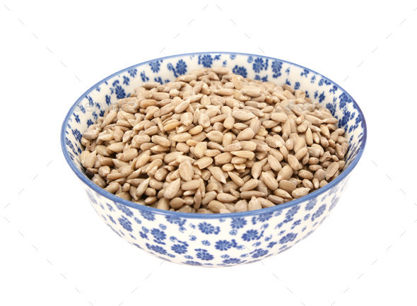 Sunflower seed hearts in a blue and white china bowl (Misc) Photo Download