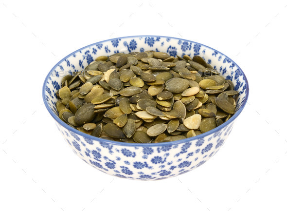 Pumpkin seeds in a blue and white china bowl (Misc) Photo Download