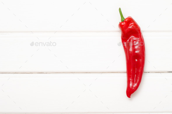 Sweet red pepper on white wooden boards (Misc) Photo Download