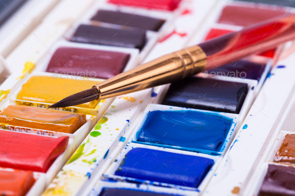 artists watercolour paints and paint brush