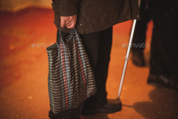 poor old men holding bag no face (Misc) Photo Download