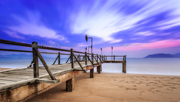 Long exposure of colorful sunrise and wooden pier (Misc) Photo Download