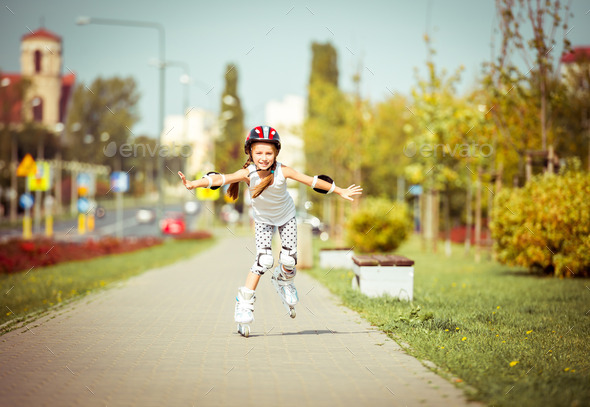 little girl on roller skates (Misc) Photo Download