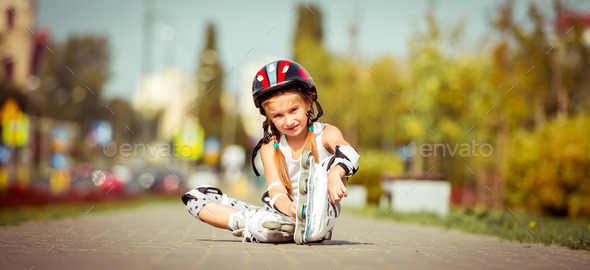 little girl on roller skates (Misc) Photo Download