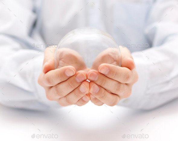 Crystal ball in hands