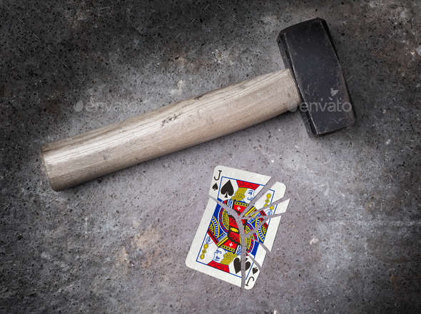 Hammer with a broken card, jack of spades