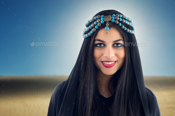 Arabian Girl wearing Traditional Headscarf, Beautiful tribal woman wrapped in scarf