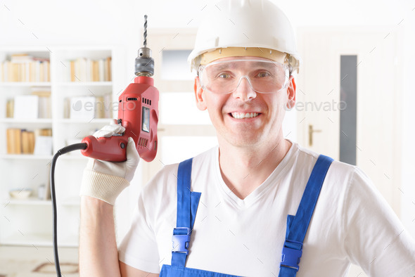 Man with electric drill