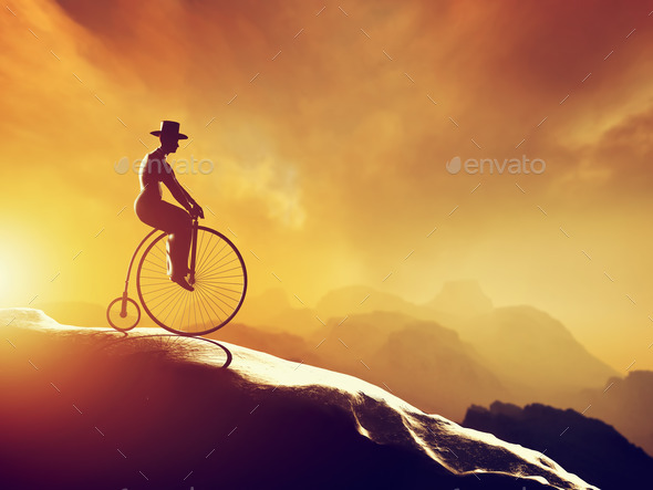 Man on retro bicycle riding downhill. Mountains scenery