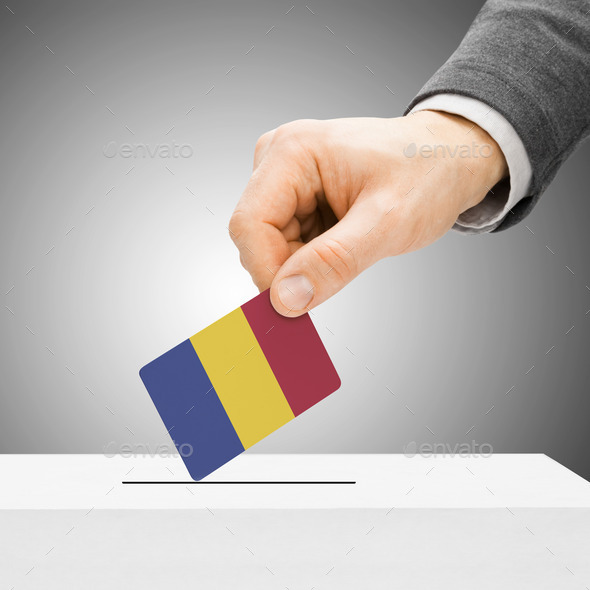 Voting concept - Male inserting flag into ballot box - Romania (Misc) Photo Download