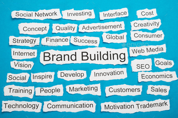 Word Brand Building On Piece Of Torn Paper (Misc) Photo Download