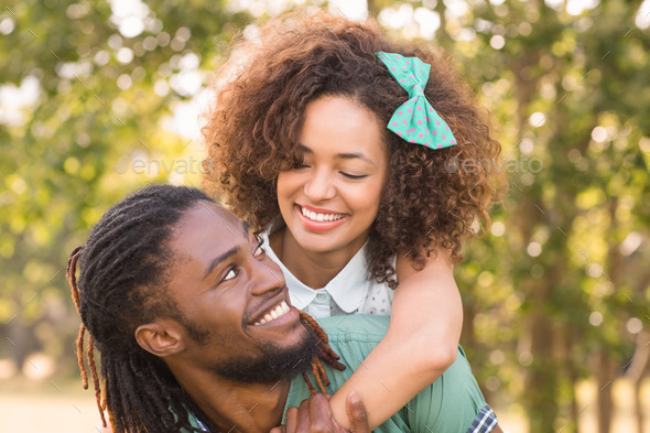 Cute couple in the park on a sunny day (Misc) Photo Download