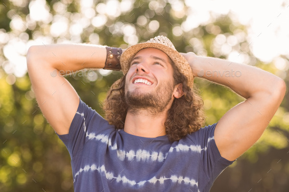 Handsome hipster in the park on a sunny day (Misc) Photo Download