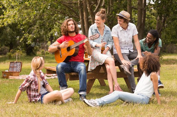 Happy friends in the park on a sunny day (Misc) Photo Download