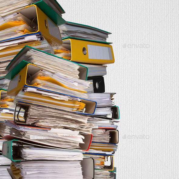 piles of file binder with documents