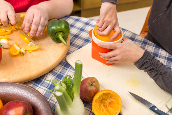 closeup two women cooking together (Misc) Photo Download