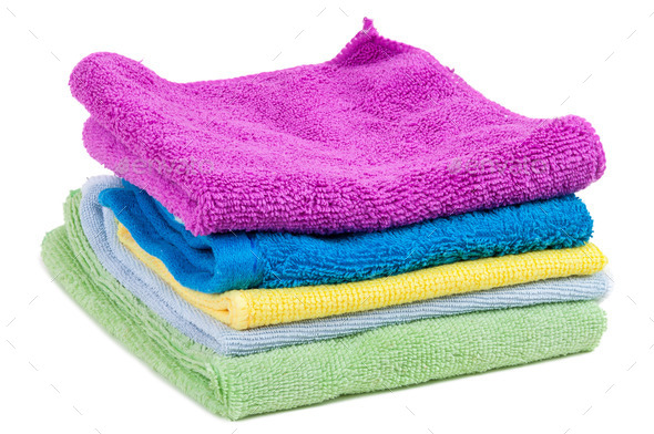 Stacked colorful towels on white background (Misc) Photo Download