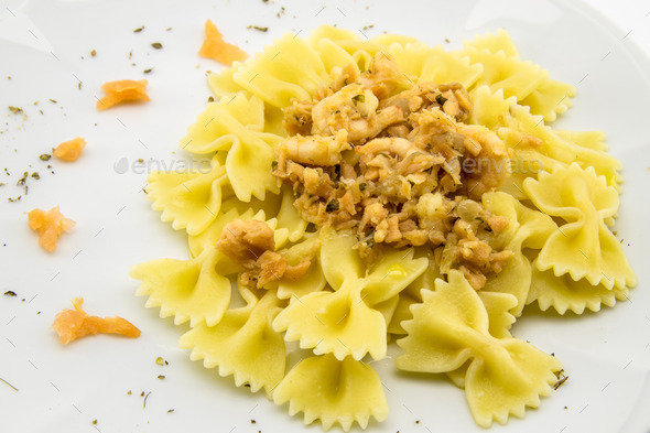 italian pasta called butterflies with shrimp salmon and basil (Misc) Photo Download