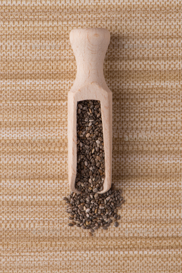 Wooden scoop with chia seeds (Misc) Photo Download