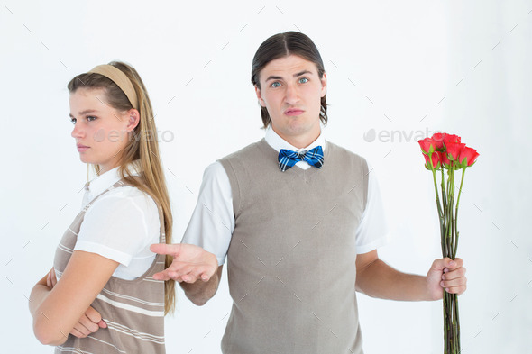 Geeky hipster couple not talking after argument on white background (Misc) Photo Download