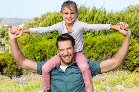 Father and daughter having fun in the countryside (Misc) Photo Download