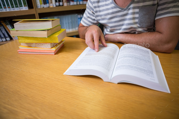 Student studying in the library at the university (Misc) Photo Download