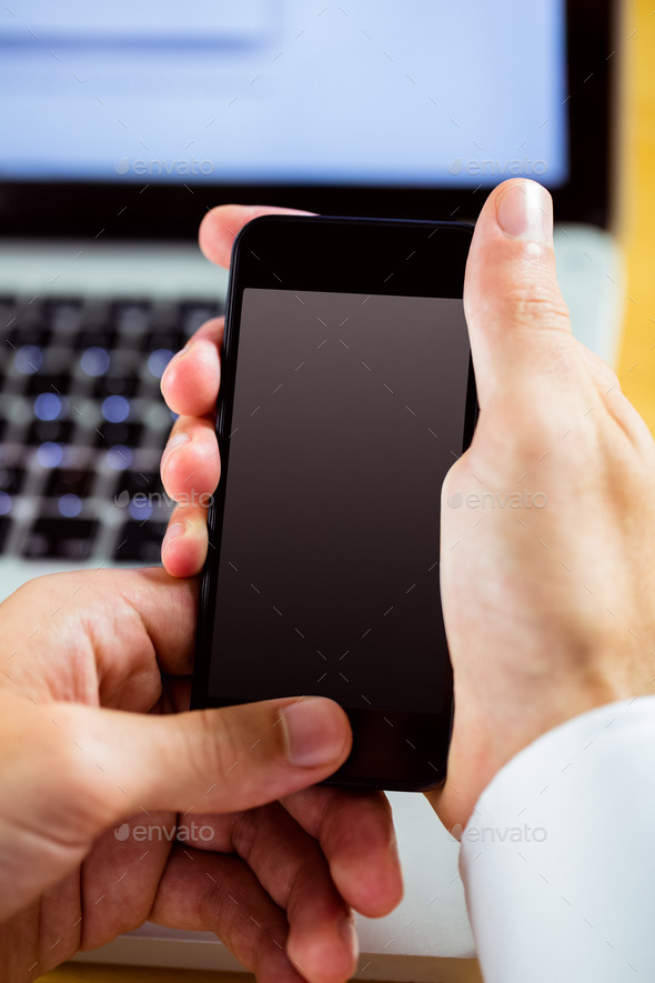 Man using laptop and smartphone in close up (Misc) Photo Download