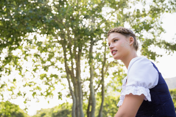 Pretty oktoberfest girl in the park on a sunny day (Misc) Photo Download