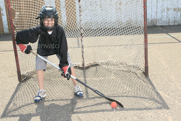A Portrait of hockey ball player with hockey stick