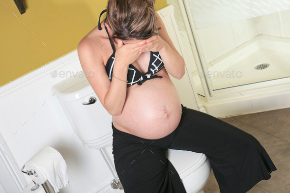 Pregnant woman having morning sickness during Pregnancy. Concept